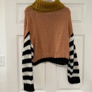 Fun and colorful turtleneck sweater by Roolee